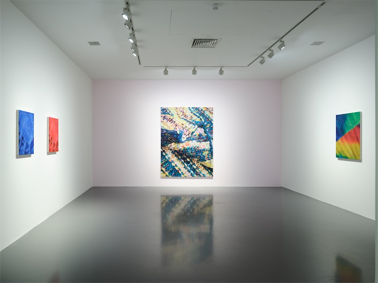 ALL KINDS OF GORGEOUS: Murray Clarke installation view. Paintings L-R: ‘Red and Blue diptych’ (2024), ‘Boiling’ (2024), ‘Rainbow Fields’ (2024). Photography: Stephen White & Co, courtesy of Nahmad Projects